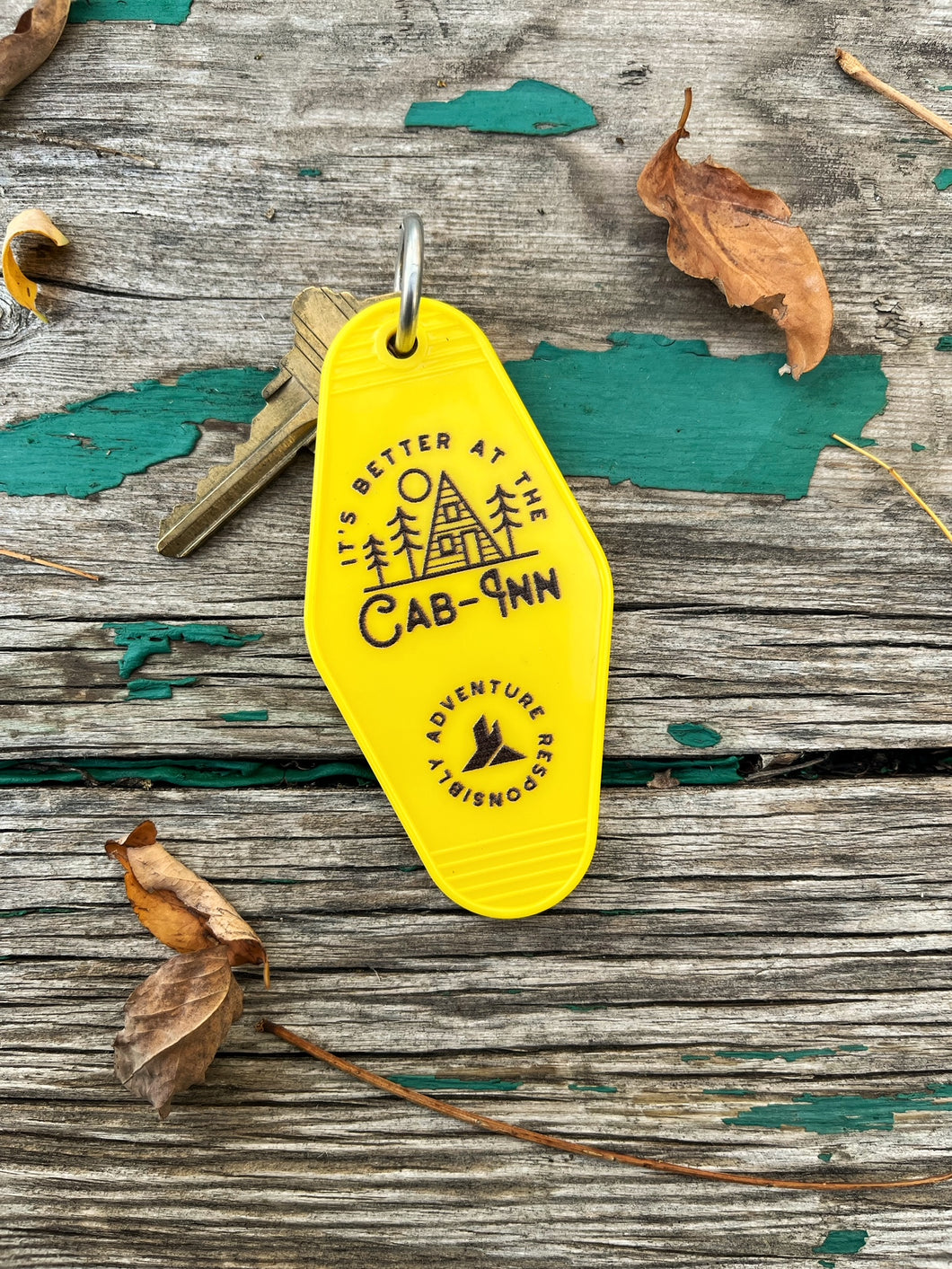 It’s better at the cabin outdoor inspired retro hotel keychain